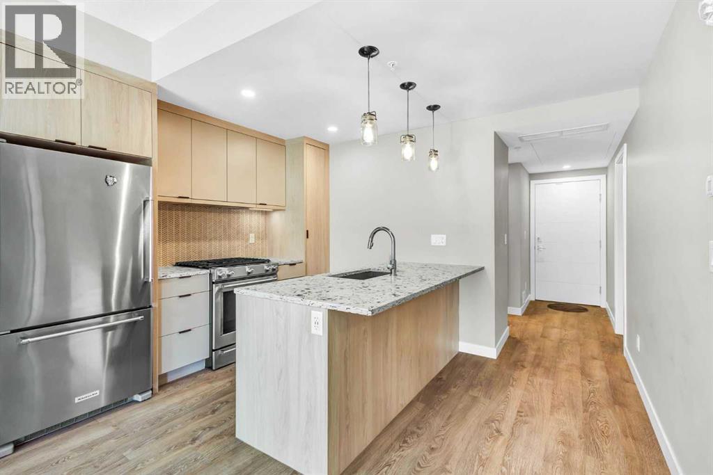 Apartment for Sale in 206, 3375 15 Street SW|Calgary, Alberta T2T4A2 2