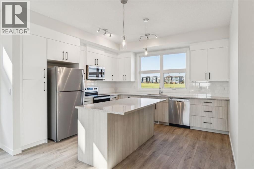 Row / Townhouse for Sale in 110, 400 Belmont Street SW|Calgary, Alberta T2X5Z1 4