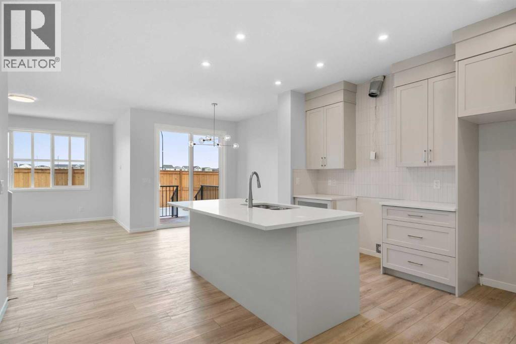 House for Sale in 659 Buffaloberry Manor SE|Calgary, Alberta T3M3Z3 3