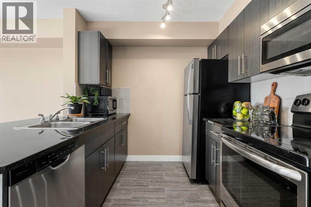 Apartment for Sale in 412, 5 Saddlestone Way NE|Calgary, Alberta T3J0S2 3