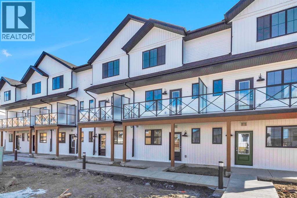 Row / Townhouse for Sale in 105, 340 Ambleton Street NW|Calgary, Alberta T3P2H5 2