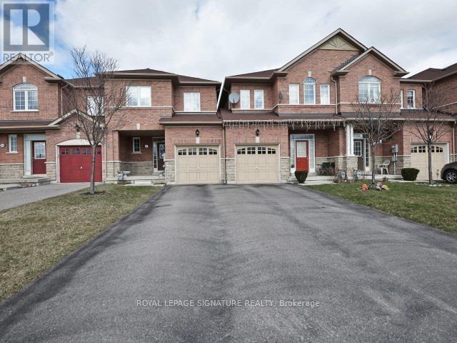 Row / Townhouse for Sale in 67 BRETON AVENUE|Mississauga (Hurontario), Ontario L4Z4K2