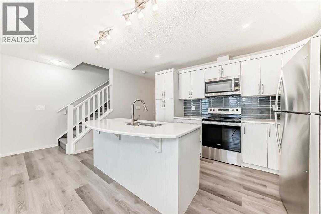 Row / Townhouse for Sale in 1337 140 Avenue NW|Calgary, Alberta T2K0E3 4