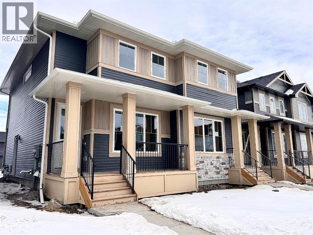 Duplex for Sale in 98 Sora Gardens SE|Calgary, Alberta T3S0V3 2