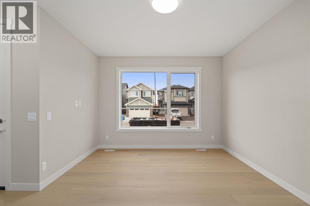 Duplex for Sale in 102 Sora Gardens SE|Calgary, Alberta T3S0V3 2