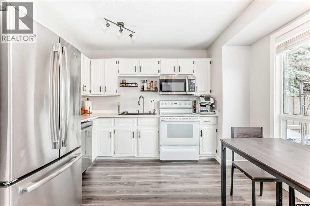 Row / Townhouse for Sale in 64, 123 Queensland  SE|Calgary, Alberta T2J5J4 4