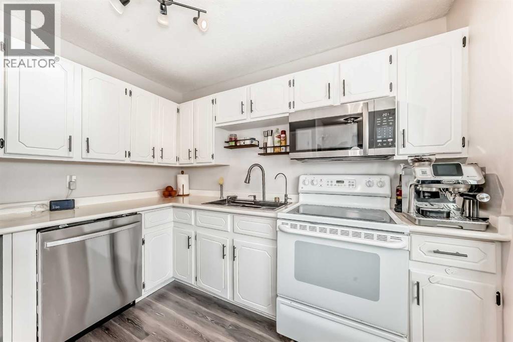 Row / Townhouse for Sale in 64, 123 Queensland  SE|Calgary, Alberta T2J5J4 5