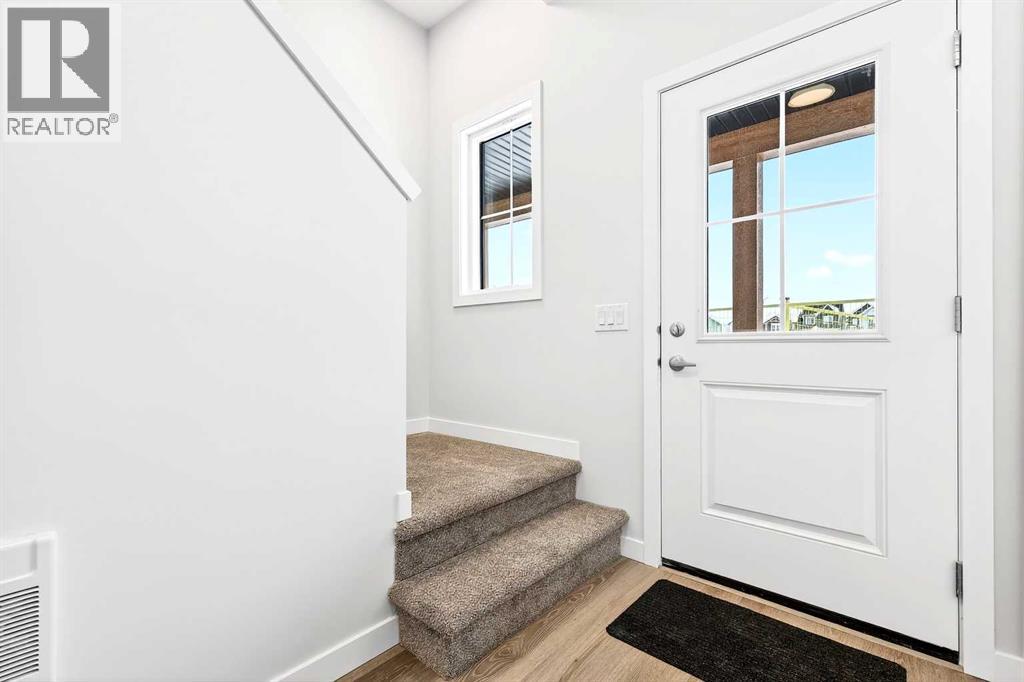 Row / Townhouse for Sale in 122, 1750 Rangeview Drive SE|Calgary, Alberta T3S0X3 2