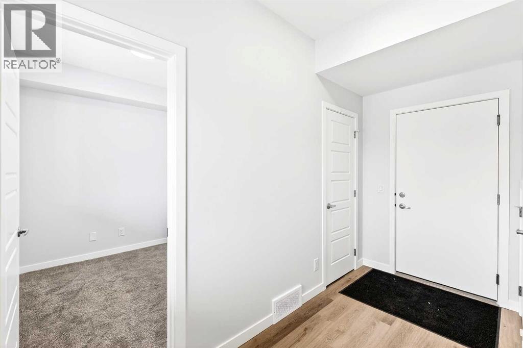 Row / Townhouse for Sale in 122, 1750 Rangeview Drive SE|Calgary, Alberta T3S0X3 3