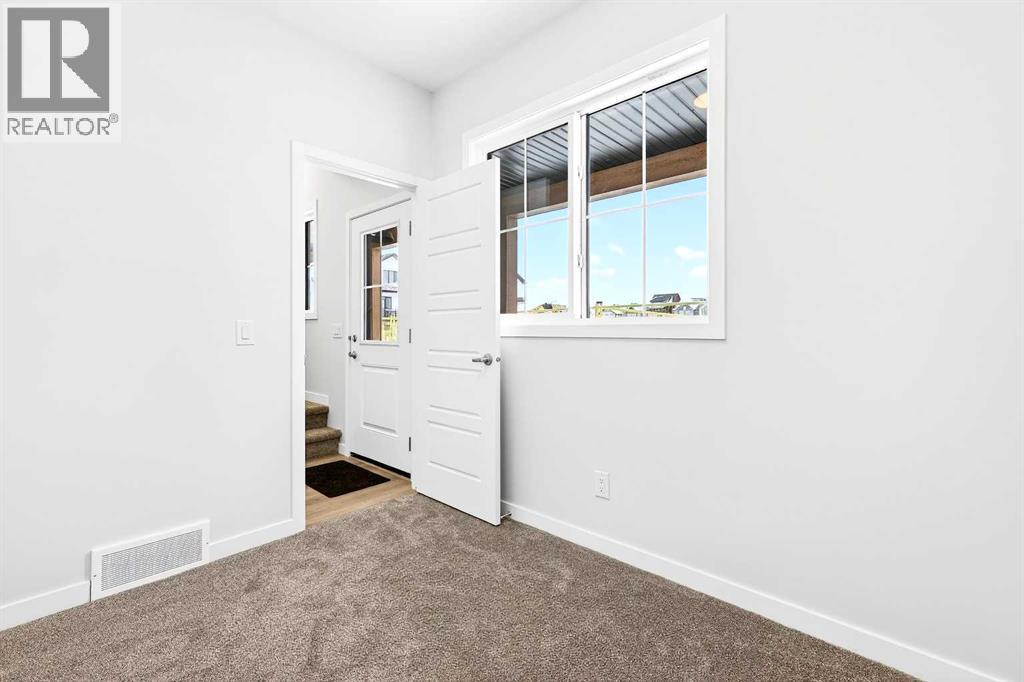 Row / Townhouse for Sale in 122, 1750 Rangeview Drive SE|Calgary, Alberta T3S0X3 5