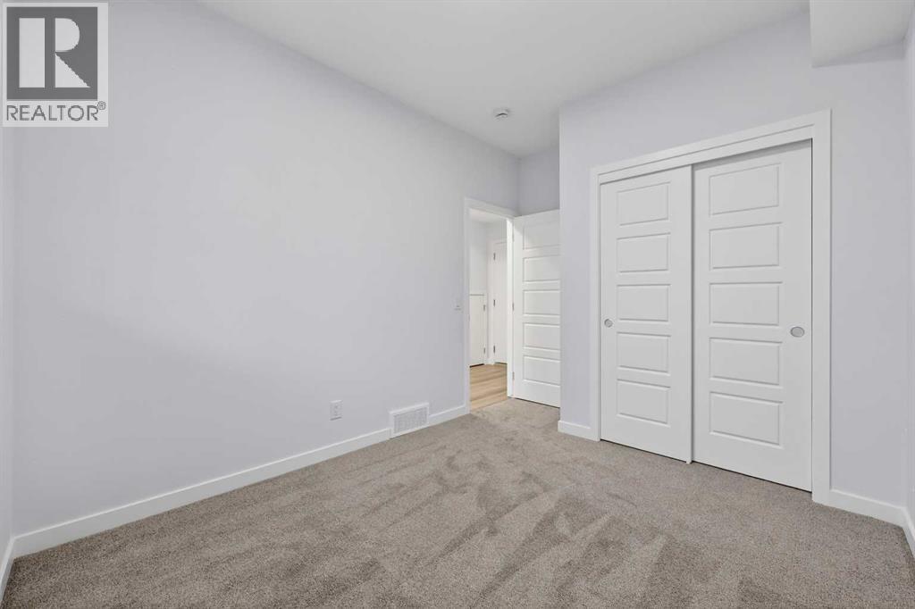 Row / Townhouse for Sale in 127, 1750 Rangeview Drive SE|Calgary, Alberta T3S0X3 4