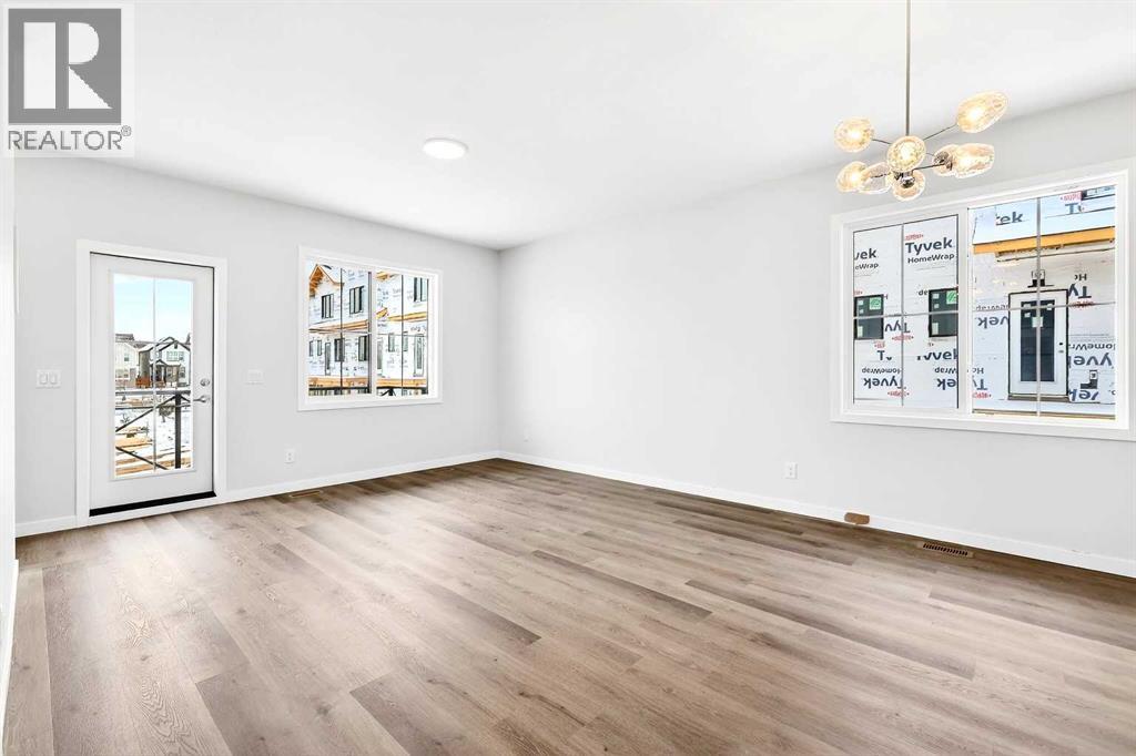 Row / Townhouse for Sale in 101, 40 Creekside Way SW|Calgary, Alberta T2X6E2 4