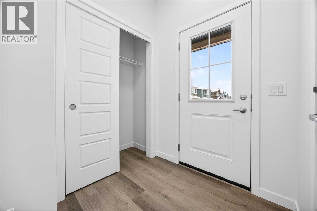 Row / Townhouse for Sale in 66 Creekside Way SW|Calgary, Alberta T2X6E2 2