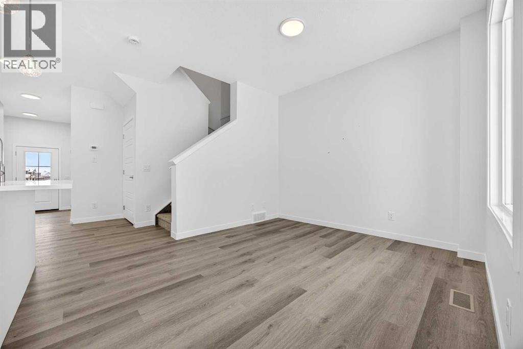 Row / Townhouse for Sale in 66 Creekside Way SW|Calgary, Alberta T2X6E2 5