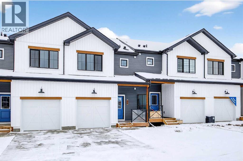 Row / Townhouse for Sale in 58 Creekside Way SW|Calgary, Alberta T2X6E2