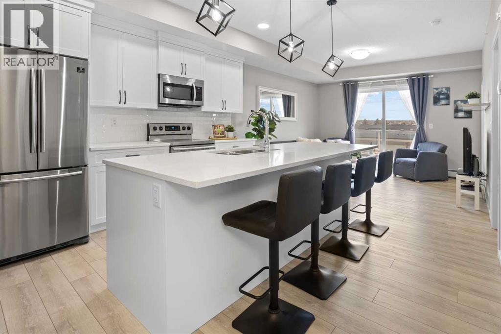 Apartment for Sale in 406, 370 Harvest Hills Common NE|Calgary, Alberta T3K2M8