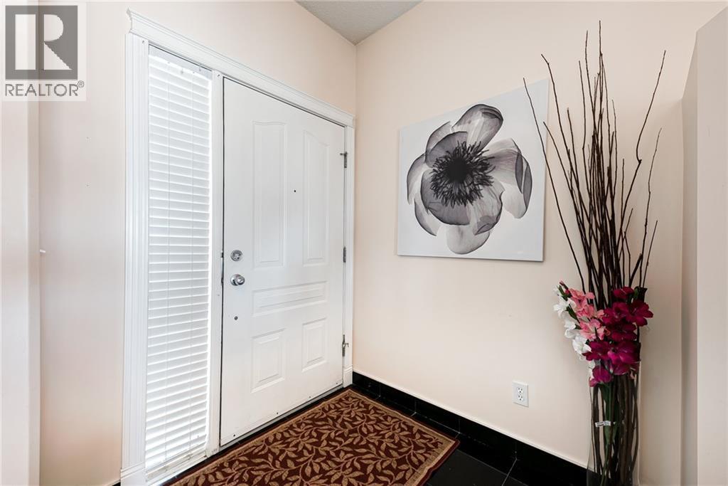 Row / Townhouse for Sale in 144 ROCKY VISTA Terrace NW|Calgary, Alberta T3G5G7 4