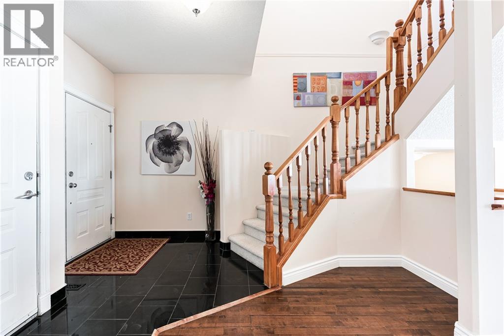 Row / Townhouse for Sale in 144 ROCKY VISTA Terrace NW|Calgary, Alberta T3G5G7 5