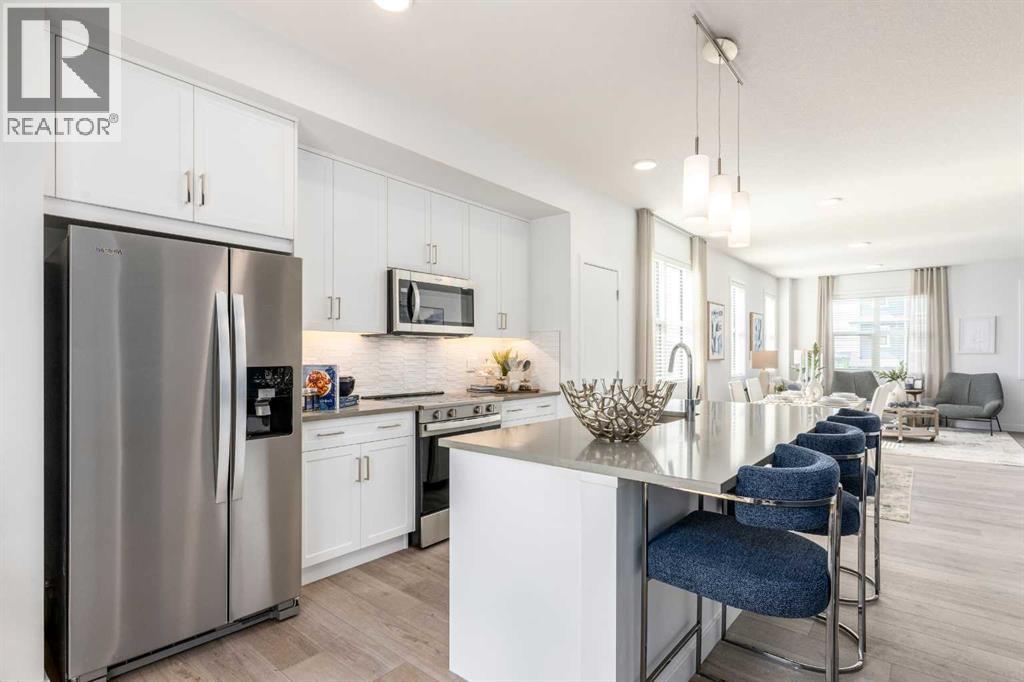 Row / Townhouse for Sale in 101, 437 Alpine Avenue SW|Calgary, Alberta T2Y0Z8