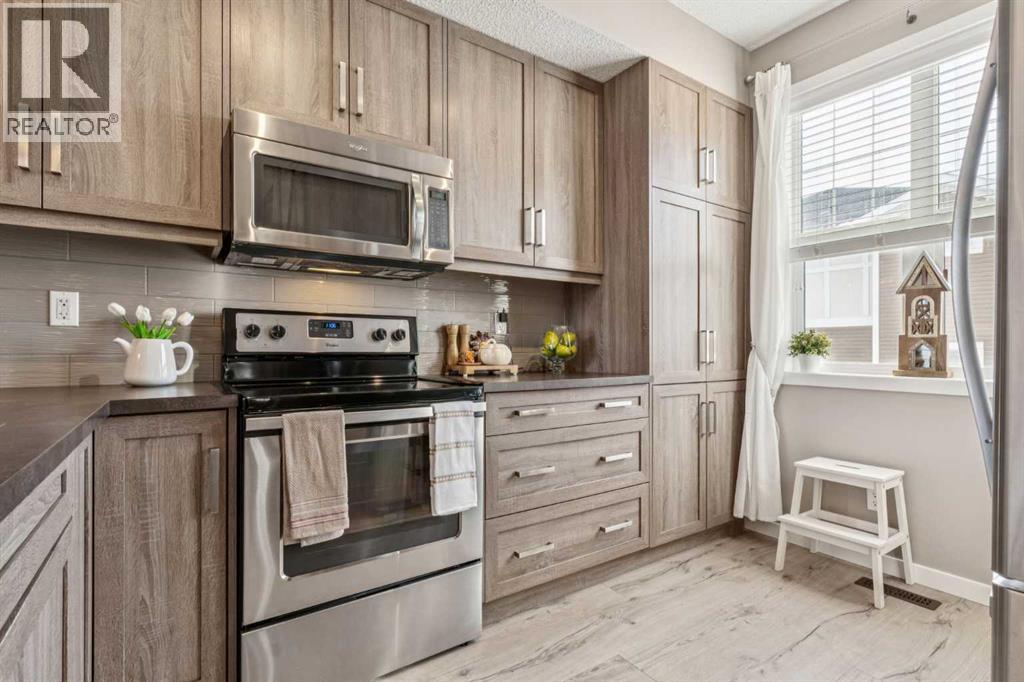 Row / Townhouse for Sale in 61 Nolancrest Gate NW|Calgary, Alberta T3R0Y1 5