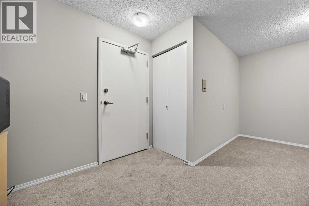 Apartment for Sale in 202B, 7301 4A Street SW|Calgary, Alberta T2V4V8 5