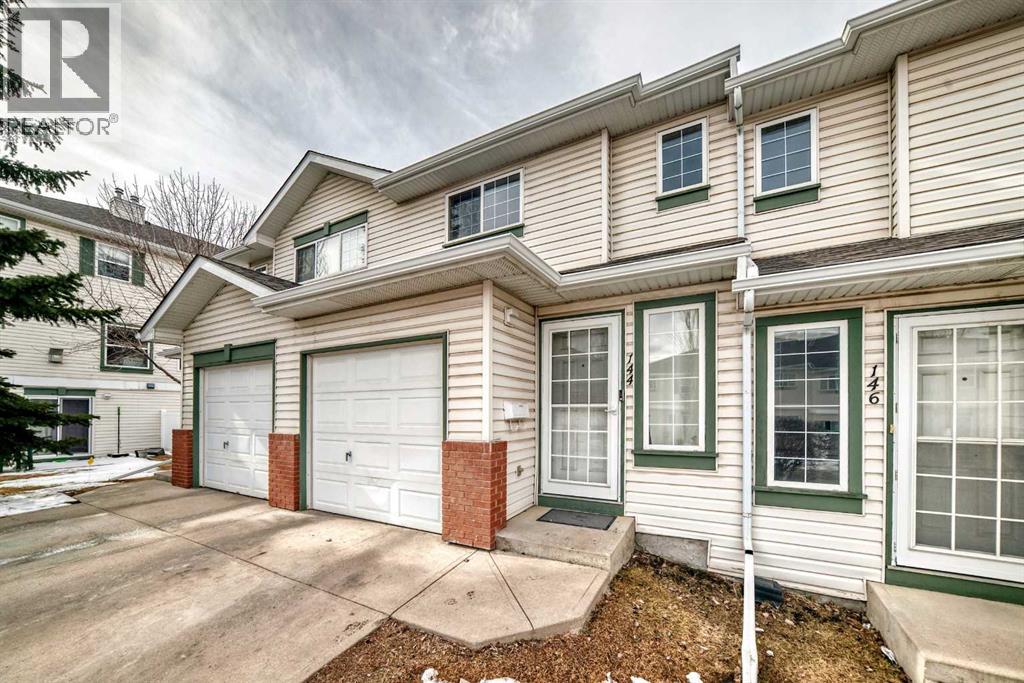 Row / Townhouse for Sale in 144 Country Hills Villas NW|Calgary, Alberta T3K4S8 2