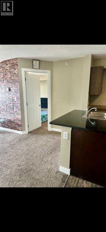 Apartment for Sale in 420, 7110 80 Avenue NE|Calgary, Alberta T3J0N4 5