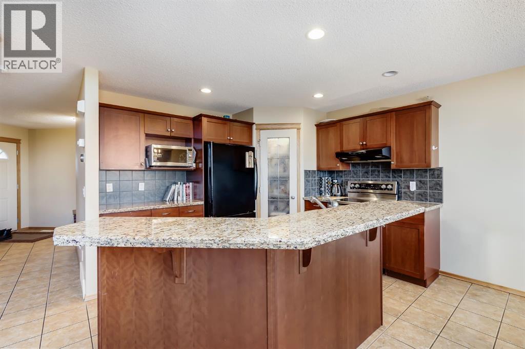 House for Sale in 96 COUGARTOWN Close SW|Calgary, Alberta T3H0B3 5