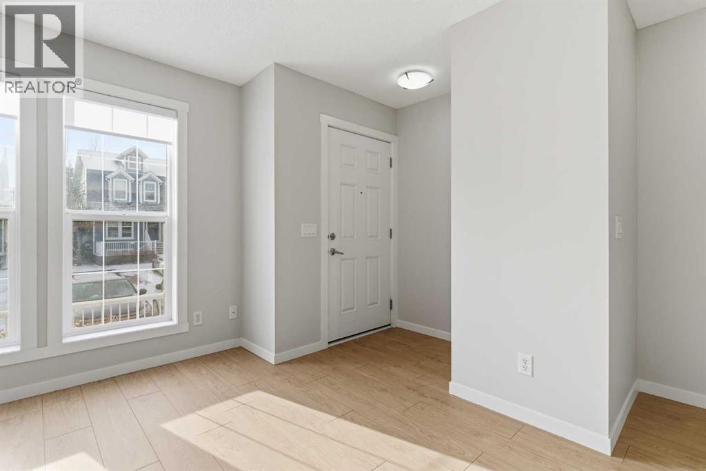 Row / Townhouse for Sale in 525 McKenzie Towne Close SE|Calgary, Alberta T2Z1A8 2