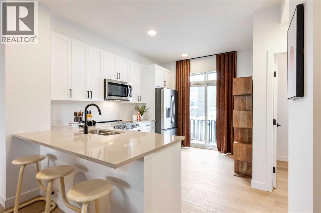 Row / Townhouse for Sale in 303, 437 Alpine Avenue SW|Calgary, Alberta T2Y0Z8 5