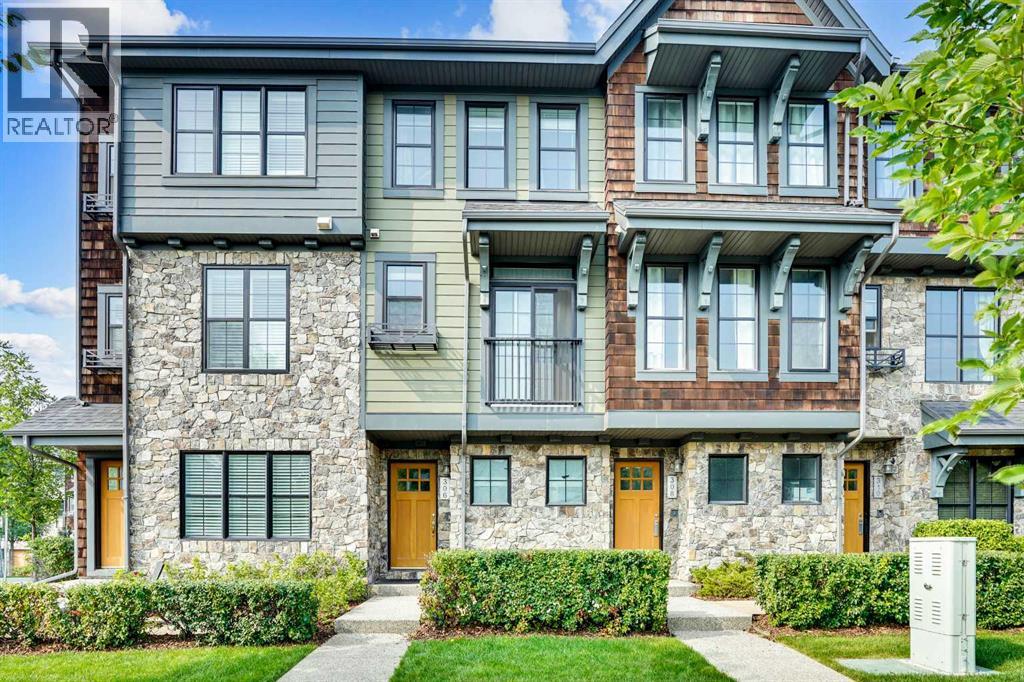 Row / Townhouse for Sale in 306 Ascot Circle SW|Calgary, Alberta T3H0X2 2