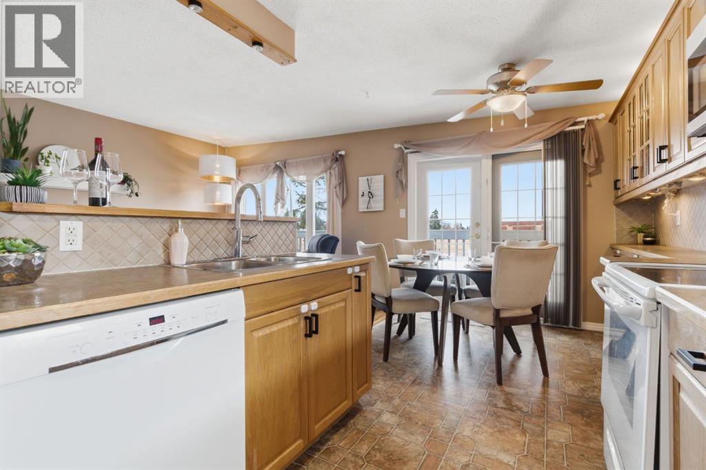 Duplex for Sale in 6605 Huntridge Hill NE|Calgary, Alberta T2K4A1 5