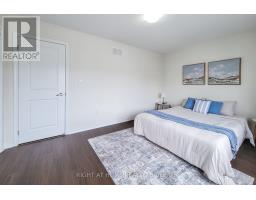 11 ESTHER CRESCENT - 32
