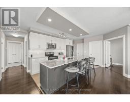605 - 240 VILLAGEWALK BOULEVARD - 7