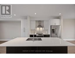 2 - 555 SUNNINGDALE ROAD E - 14