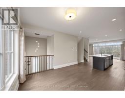 2 - 555 SUNNINGDALE ROAD E - 9