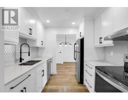 907 - 860 COMMISSIONERS ROAD E - 8