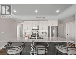 605 - 240 VILLAGEWALK BOULEVARD - 4