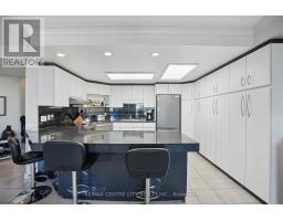 703 - 1255 COMMISSIONERS ROAD W - 8