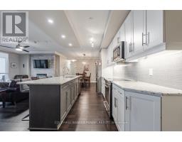 309 - 260 VILLAGEWALK BOULEVARD - 7