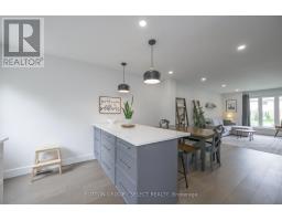 102 - 1328 COMMISSIONERS ROAD W - 13