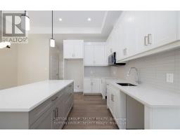 14 - 7966 FALLON DRIVE - 7