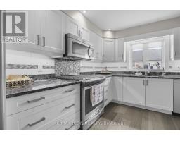 35 - 175 INGERSOLL STREET N - 14