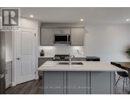 100 GILMOUR DRIVE - 18
