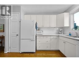 10 - 215 COMMISSIONERS ROAD W - 9