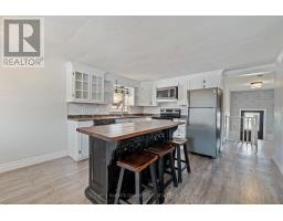 208 VICTORIA AVENUE E - 6