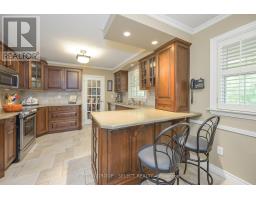 272 COMMISSIONERS ROAD E - 11