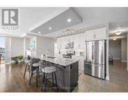 605 - 240 VILLAGEWALK BOULEVARD - 13