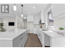 9 - 7966 FALLON DRIVE - 3