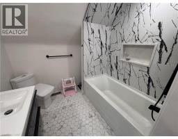 122 QUEENSDALE Avenue E - 12